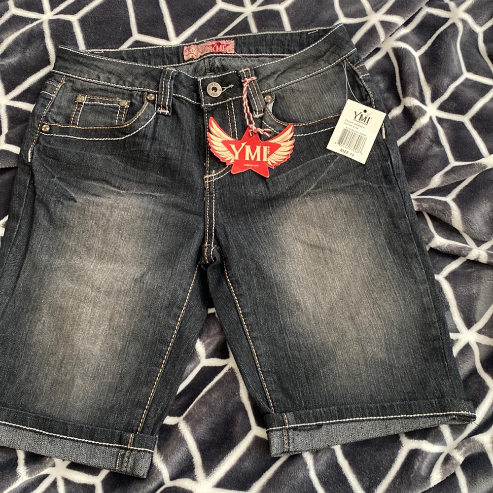 NWT. YMI shorts. Blue black rinse. Size 12. Five pockets. Stretchy. Low rise